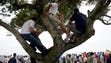 Golf fans watch the play of the Tiger Woods, Phil Mickelson