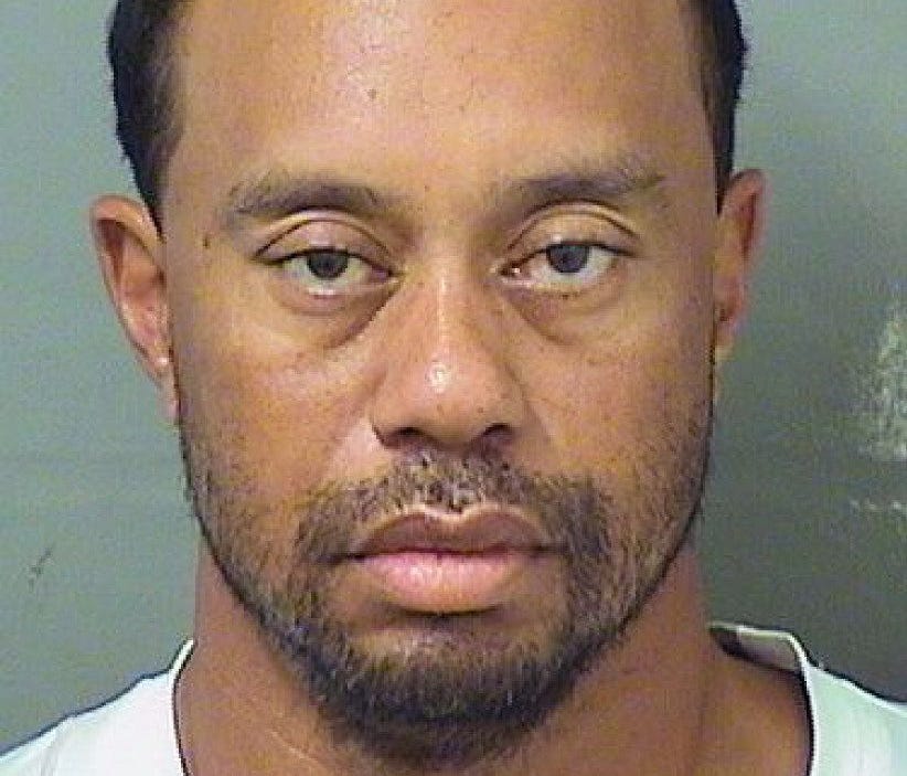 Tiger Woods had to be woken up by an officer after his Mercedes was found stopped on a Florida road.