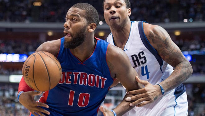 Mavericks forward Greg Smith (4) defends against Detroit Pistons forward Greg Monroe (10) during the second half at the American Airlines Center. The Pistons defeated the Mavericks 108-95.