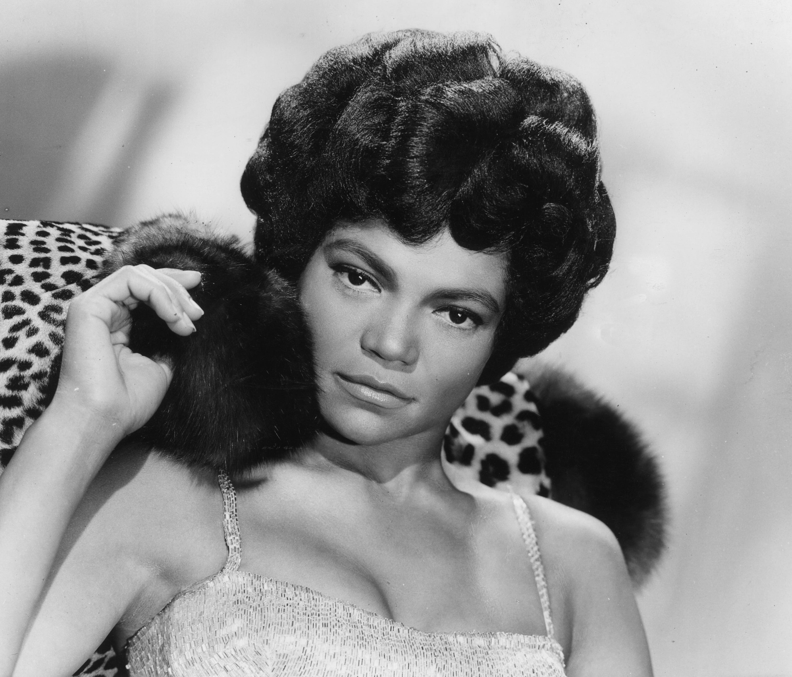 1960:  (FILE PHOTO) American singer and actress Eartha Kitt decked poses in leopard skin and furs for her London stage show 'Talk of the Town', a 45-minute programme of old and new numbers on September 9, 1960. Kitt, 81 died of colon cancer on Decemb