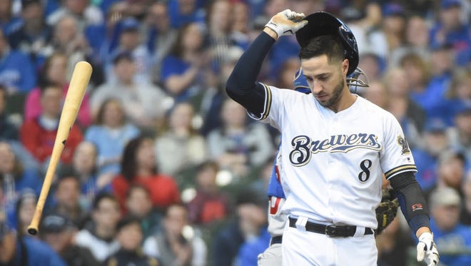 Brewers leftfielder Ryan Braun reacts after striking out in the first inning Sunday against the Cubs at Miller Park.