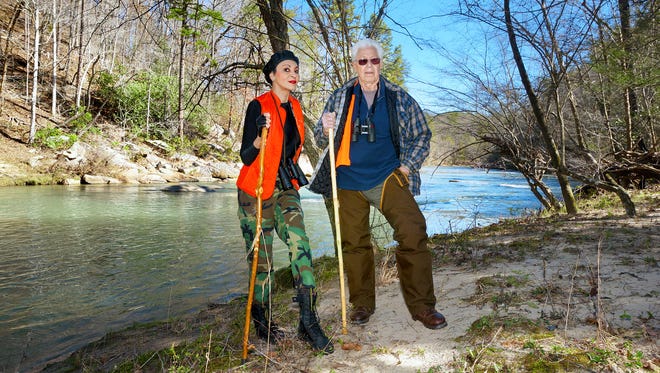 Regina Lynch-Hudson and her uncle, Wallace Lynch, pause by the Broad River in Rutherford County in their search for the place where Wallace Lynch grew up.