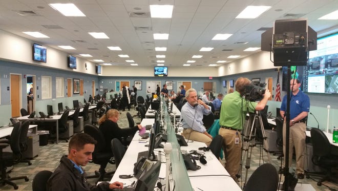 Florida Power & Light Co. officials monitor Hurricane Matthew at the company's Command Center in Palm Beach County.