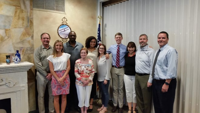 Exchange Club of Vero Beach Students of the Month and their parents, from left, Andrew Hartline, Hope Hartline, Octavian Sims, Betsy Craun, Lilliana Sims, Nicole Jimenez, Spencer Cady, Doreen Cady, Bruce Cady and Chris Robertson, who is the new head of CASTLE.