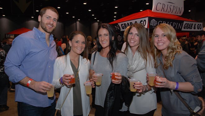 The seventh annual Cincy Winter Beerfest brought more than 350 craft beers – and thousands of beer drinkers – to Duke Energy Convention Center. Eric Schneider, Amanda Mapes, Justine Rogers, Chloe Leslie and Jennifer Van Sickle.