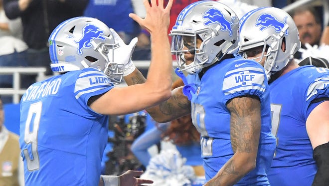 Lions quarterback Matthew Stafford and rookie wide receiver Kenny Golladay come together after Golliday's first NFL touchdown in the fourth quarter.