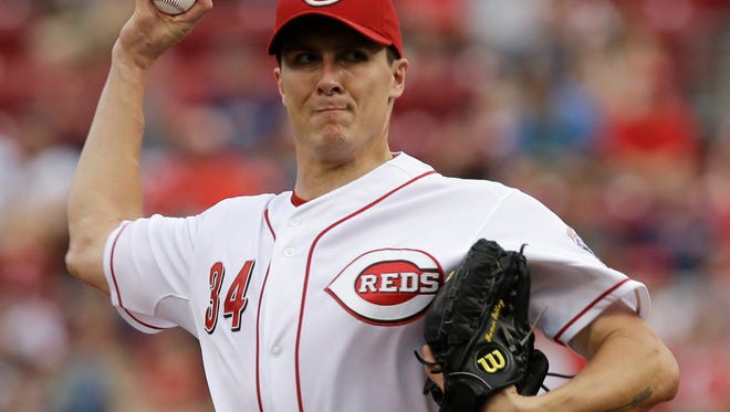 Cincinnati Reds starting pitcher Homer Bailey throws against the Cleveland Indians in the first inning of a baseball game, Thursday, Aug. 7, 2014, in Cincinnati. (AP Photo/Al Behrman)