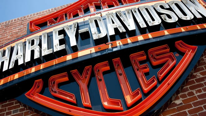 FILE - This Monday, July 16, 2012, photo, shows a sign for Harley-Davidson Motorcycles at the Harley-Davidsonstore in Glendale, Calif. The U.S. government is investigating complaints from Harley-Davidson riders who say their motorcycle brakes failed without warning, Friday, July 8, 2016. The National Highway Traffic Safety Administration says the investigation covers 430,000 motorcycles with model years between 2008 and 2011. (AP Photo/Grant Hindsley, File)