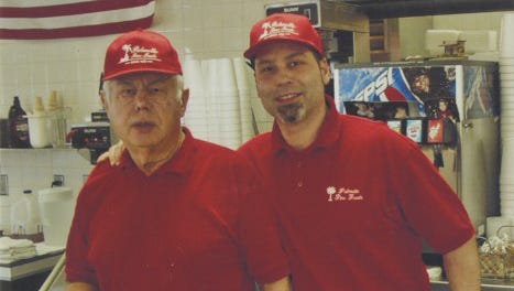 Bill Skenteris, who opened Palmetto Fine Foods in Greenville in 1959, with his son, Nick Skenteris, who runs the restaurant today.