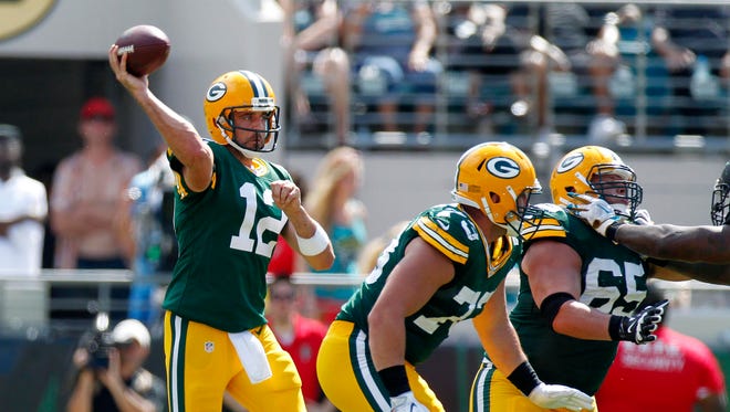 Green Bay Packers quarterback Aaron Rodgers (12) looks to pass against the Jacksonville Jaguars.