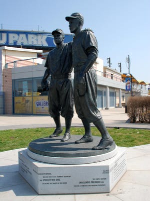 This undated image provided by the Brooklyn Cyclones shows a statue of Pee Wee Reese and Jackie Robinson at MCU Park in Brooklyn, N.Y., where the minor league Cyclones team plays.