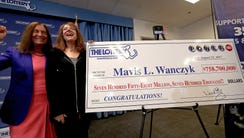 Mavis L. Wanczyk, right, poses with Massachusetts state