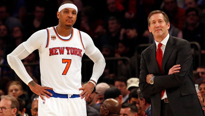 New York Knicks head coach Jeff Hornacek looks on during a break in action with Carmelo Anthony against the Indiana Pacers.