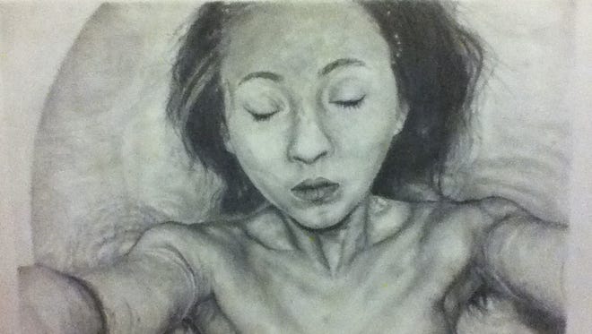 This pencil drawing self-portrait by Dominique Lucier, titled “Deep Within,” earned the YHS junior a silver medal in the national 2014 Scholastic Art & Writing Awards competition.