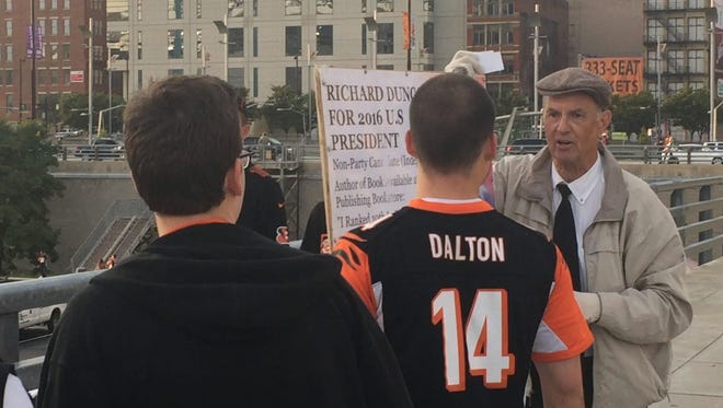Richard Duncan campaigns outside Thursday night's Bengals game.