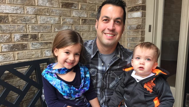 Sam Hornish Jr. and two of his children: Eliza and Sammy.
