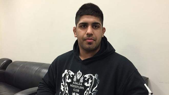 Oregon State's Amarveer Dhesi won the Pac-12 heavweight wrestling championship.