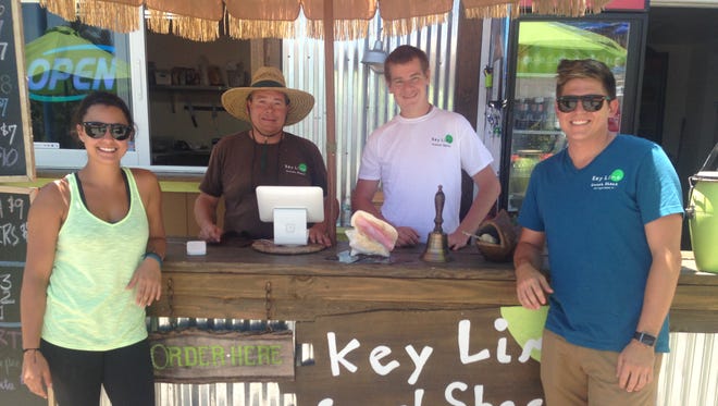Gabbi Savoia, Dave Thombs, Quinn Tousignant and owner Jace LaValle at Key Lime Conch Shack on Fort Myers Beach.