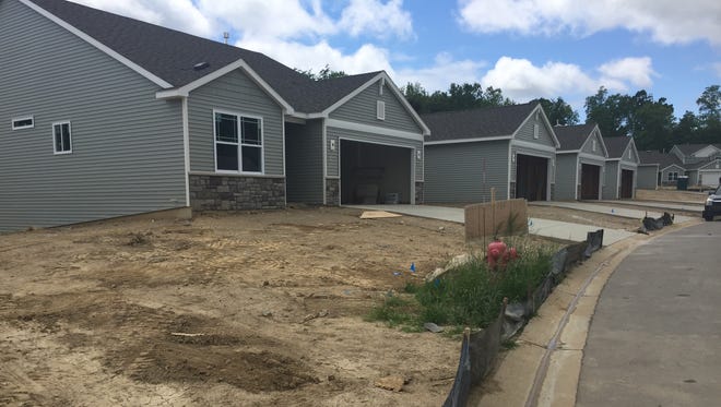New homes are under construction by Mitch Harris Building Company in The Meadows subdivision in Marion Township, in this photograph taken  Monday, June 5, 2017.