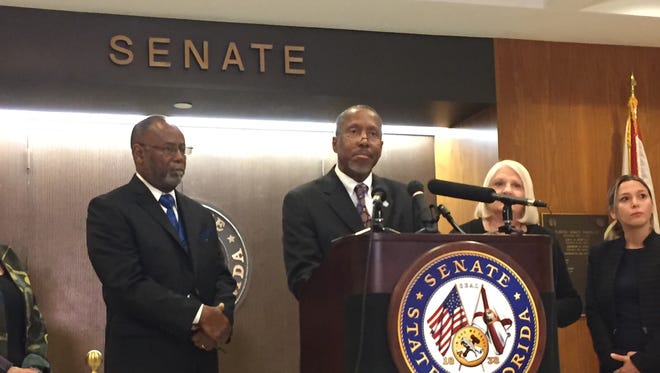 Pastor Reginald Gundy of Jacksonville (l) joins Sen. Daryl Rouson, D-St. Petersburg, to announce Florida Clergy United support of a bill to extend civil rights to LGBTQ people.