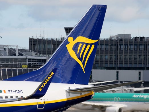 A Ryanair plane is parked at the Dublin Airport on