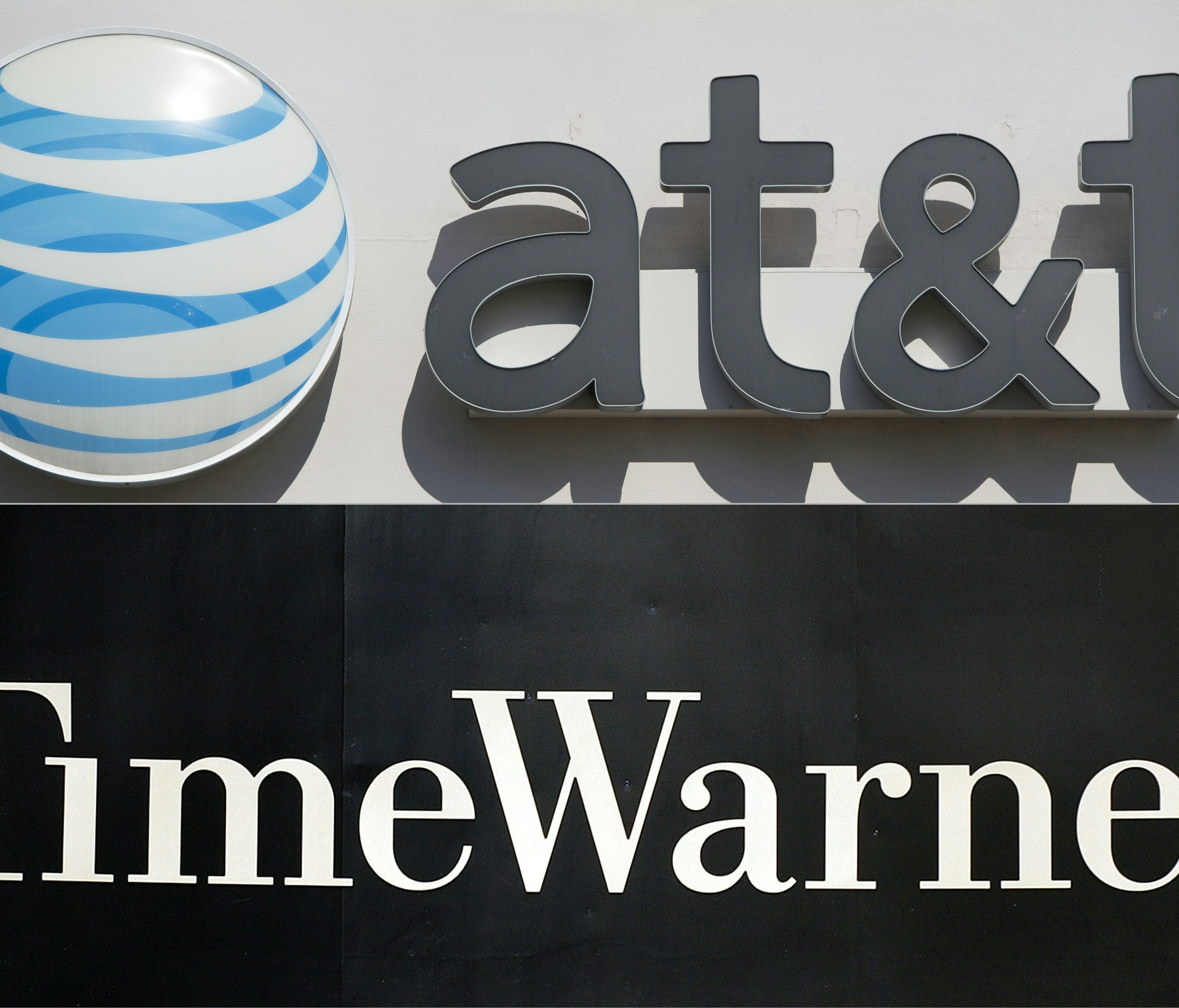 Tile combination of pictures created on October 21, 2016 shows an AT&T cellphone store in Springfield, Va., and the Time Warner logo on the front of the company's headquarters building in New York.   AT&T's $85.4 billion bid for Time Warner now faces 