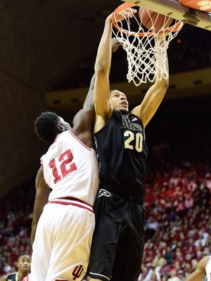 Purdue center A.J. Hammons (20) dunks against Indiana forward Hanner Mosquera-Perea during a 67-63 Boilermaker victory at Assembly Hall.