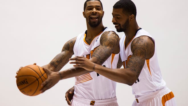 Suns's Media Day suns093013dsTwins Marcus Morris (cq) (left) and Markieff Morris (cq) are photographed during the Phoenix Suns media day at US Airways Center on Monday, September 30, 2013 in Phoenix, Arizona. Stacie Scott/The Arizona Republic