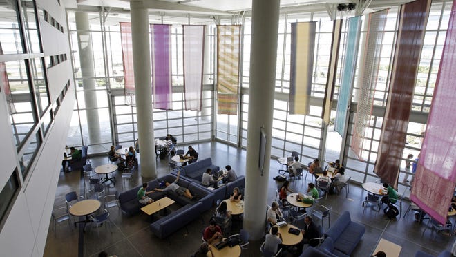 Merced students lounge in the 'lantern', a meeting place at the heart of campus in Merced, Calif., Monday, April 20, 2009.