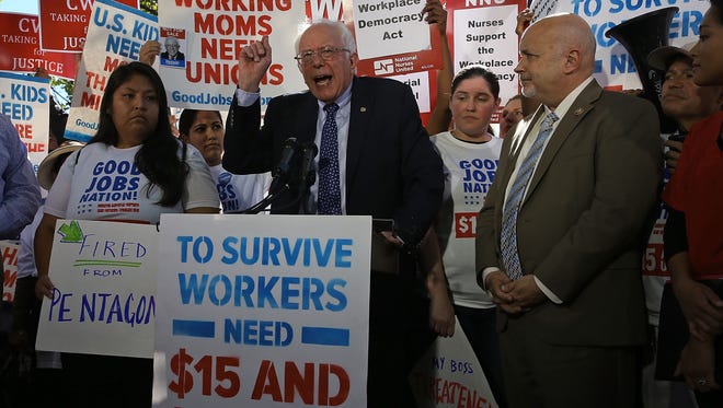 Sen. Bernie Sanders, I-Vt., speaks during a news conference on better wages for workers on Capitol Hill on Oct. 6, 2015.