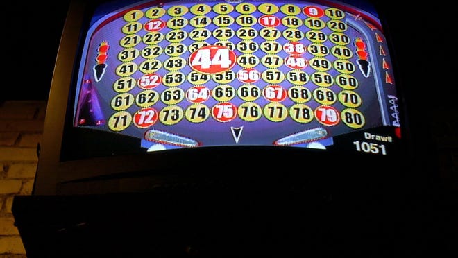 A TV screen above a bar shows Keno drawing numbers.