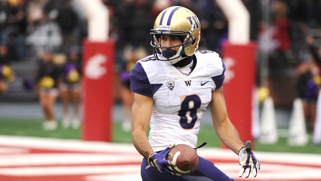 Huskies wide receiver Dante Pettis scores a touchdown against Washington State during last year's Apple Cup.