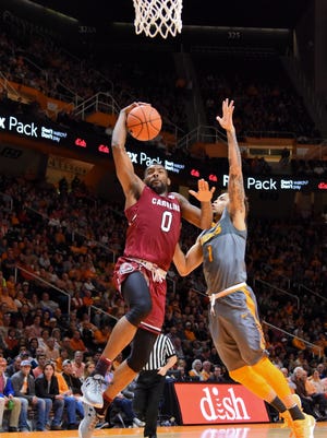 South Carolina Gamecocks guard Sindarius Thornwell (0) goes to the basket against Tennessee Volunteers guard Lamonte Turner (1) during the second half at Thompson-Boling Arena. South Carolina won 70 to 60.