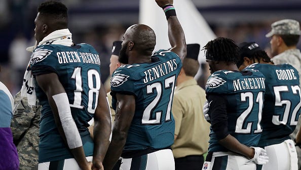 ARLINGTON, TX - OCTOBER 30:  Malcolm Jenkins #27 of the Philadelphia Eagles stands during the national anthem before a game between the Dallas Cowboys and the Philadelphia Eagles at AT&T Stadium on October 30, 2016 in Arlington, Texas.  (Photo by Ronald Martinez/Getty Images)