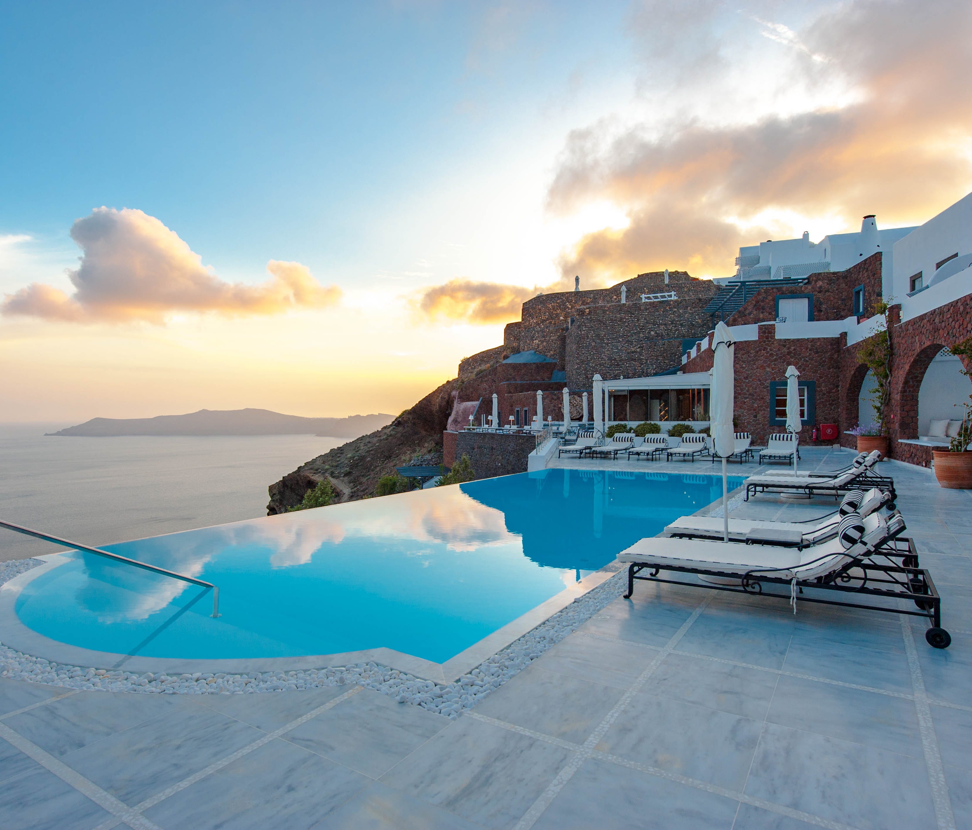 San Antonio Hotel, Santorini: Santorini is not in short supply of Instagram-able properties — and San Antonio Hotel, located in a secluded spot at the narrowest point on the island, is one prime example. Built into a natural cave formation within the