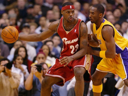 Cleveland rookie LeBron James drives the baseline on