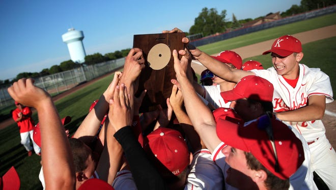 Kimberly holds up their sectional championship plaque after their win over West De Pere Tuesday, June 5, 2018, at Appleton East High School in Appleton, Wis. Danny Damiani/USA TODAY NETWORK-Wisconsin