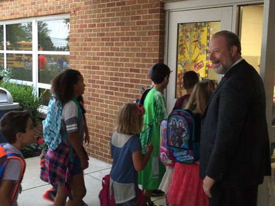 EVSC Supt. David Smith greets Oak Hill Elementary students