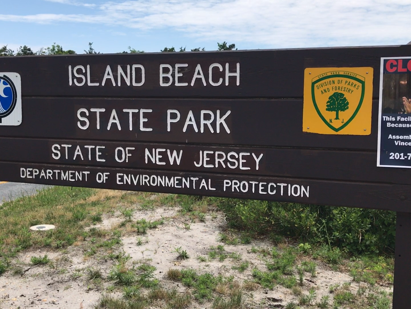 The entrance sign for Island Beach State Park, as it appeared Saturday, following the state government shutdown.
