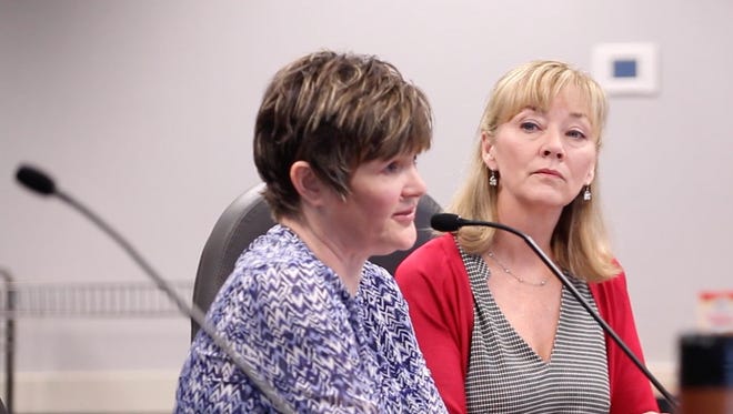 A nurse, at left, pleads her case before the Virginia Board of Nursing.