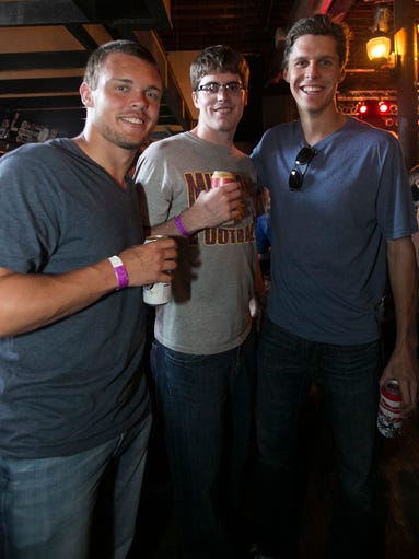 Jon Davis, 21, left, Craig Tigges, 23, middle, and