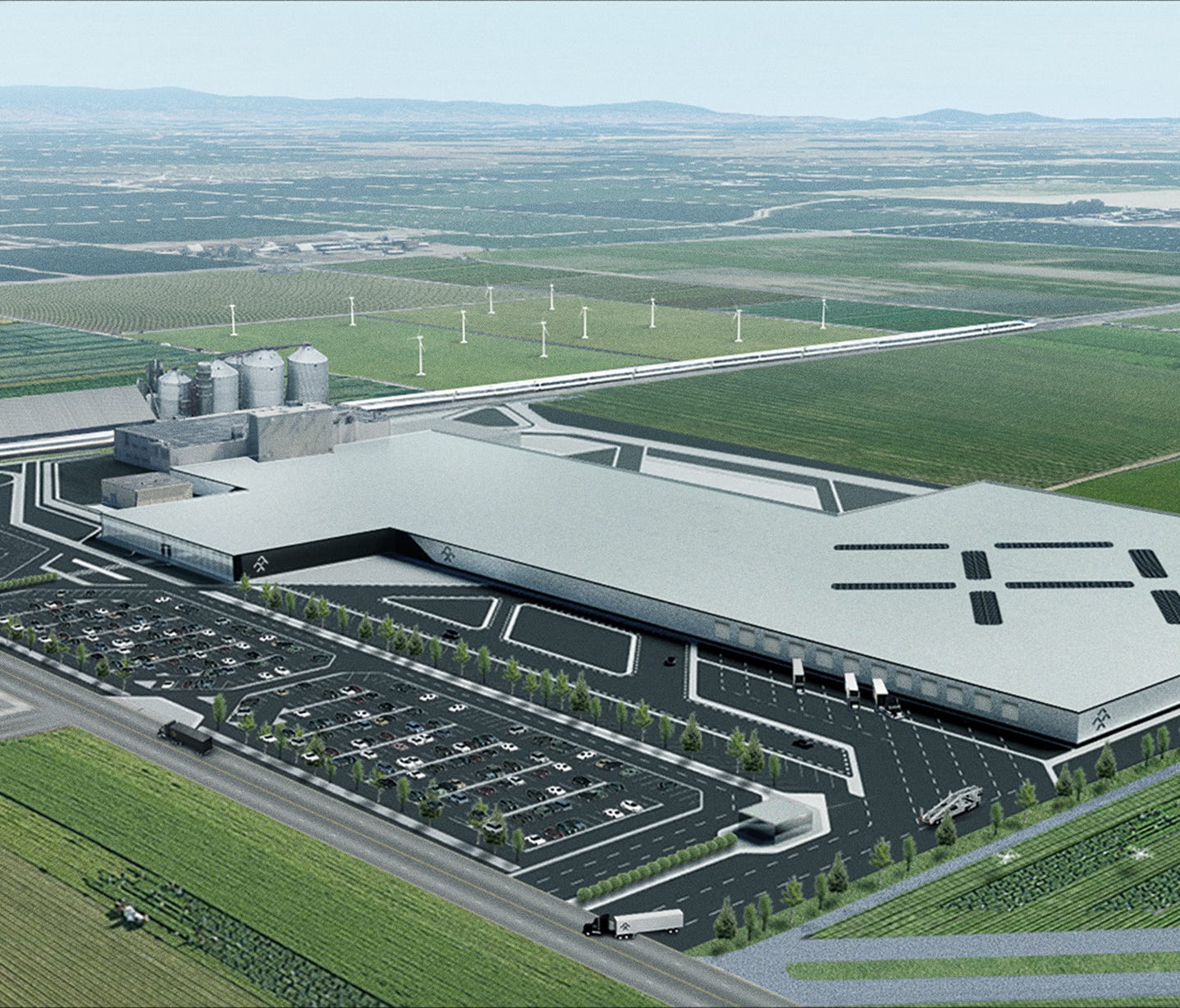 A sketch of what Faraday Future's facility in Hanford, Calif., could look like once the EV automaker starts producing cars there in 2018. The factory used to make Pirelli tires.