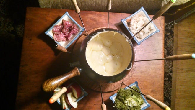 Cheese fondue is easy to make and a great way to mark Iowa's game against Wisconsin.