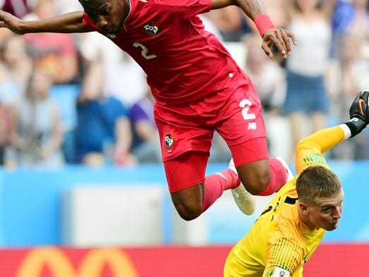 Panama's defender Michael Murillo jumps over England's