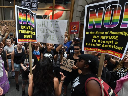 Protestors march near Trump Tower in New York on Aug.