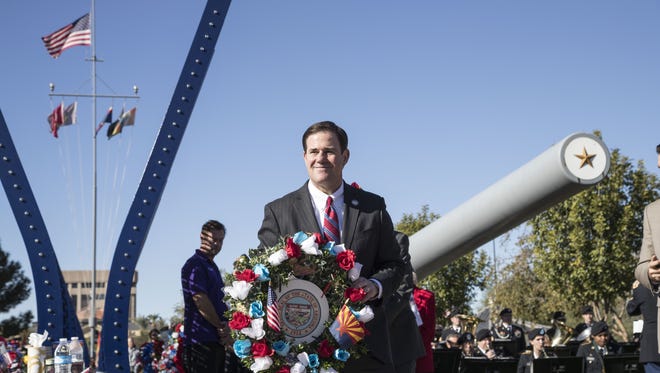 Gov. Doug Ducey offers remarks and places a wreath on behalf of the state on Arizona’s Pearl Harbor Remembrance Day at Wesley Bolin Memorial Plaza in Phoenix on Dec 7, 2017.