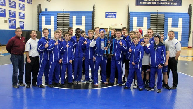 Horseheads wrestlers with their trophy Saturday after winning their own Mark Stephens Classic.
