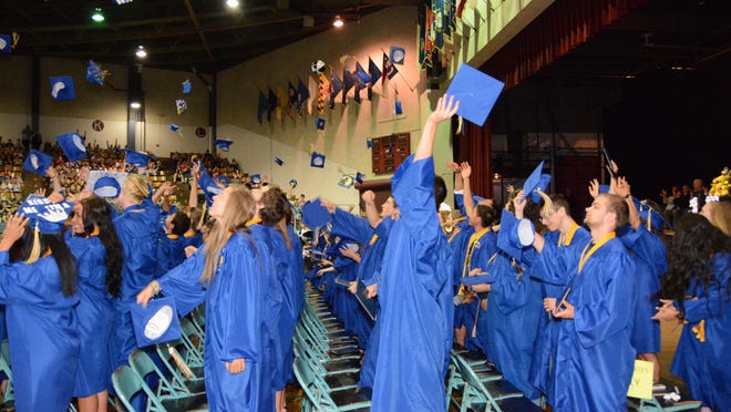 Students celebrate at Stayton High School’s graduation ceremony on Friday in the Salem Armory.