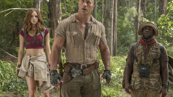 Karen Gillan, Dwayne Johnson and Kevin Hart play avatars for teens who have been transported into a game in “Jumanji: Welcome to the Jungle.”
