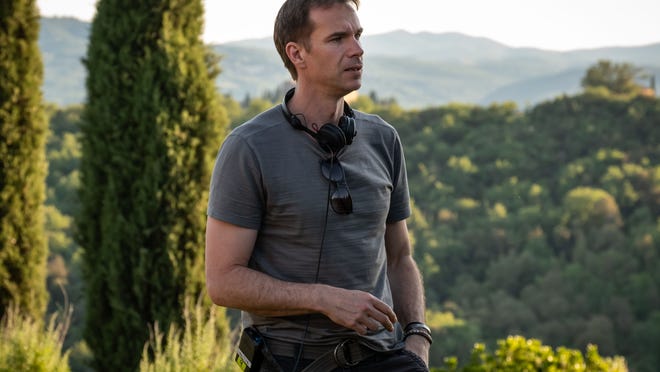 James D'Arcy takes a breather in the Tuscan countryside before directing his next shot.